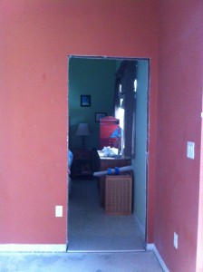 The new door to the master bedroom is on the opposite end of the wall.